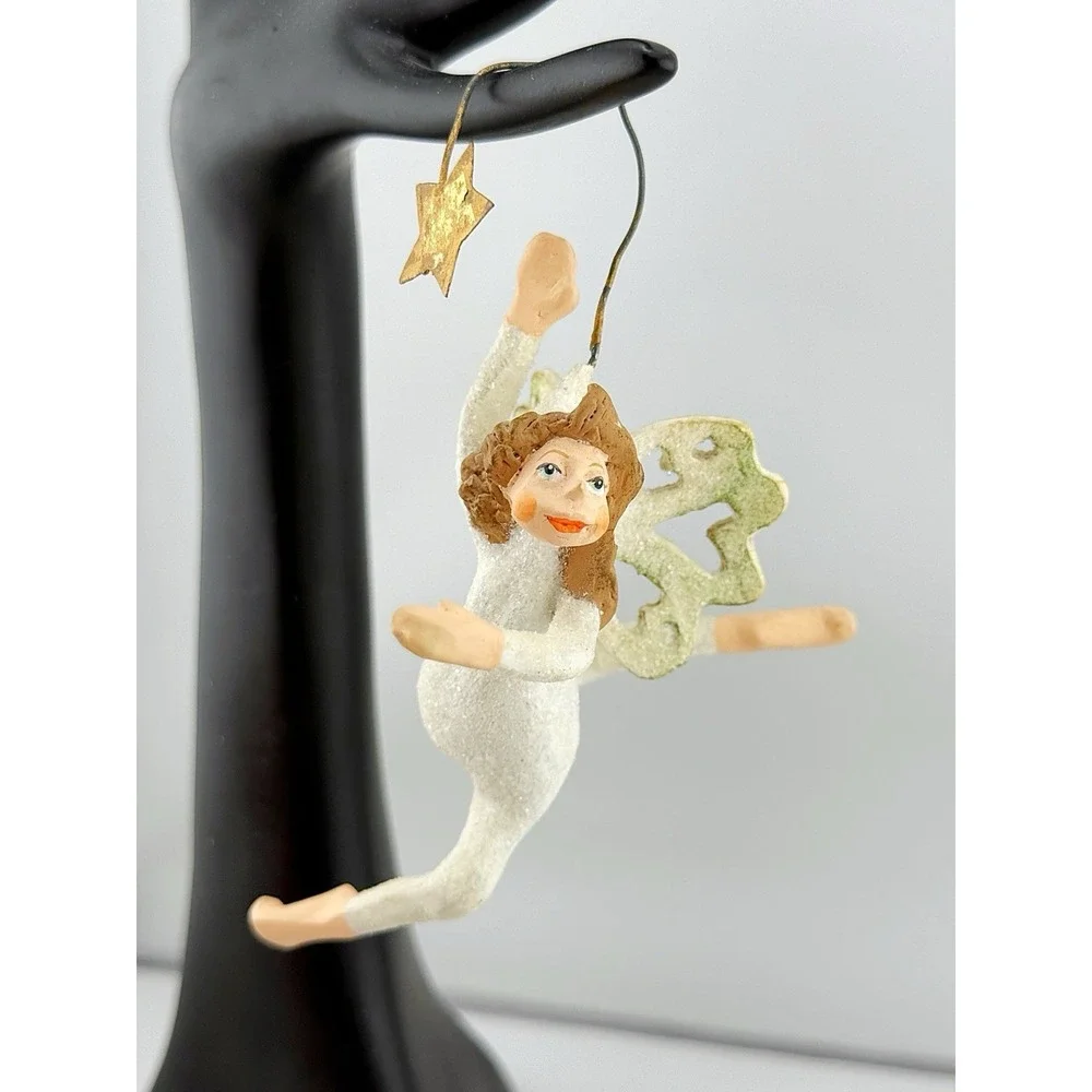 Dancing Angel With A Star Glittery Ornament. 5.5